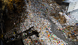 Recycled products on the floor at a recycle facility.