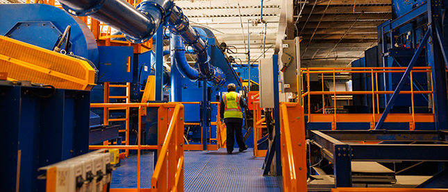 A worker in a Casella recycling facility 