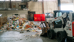 A Casella recycle facility with a forklift moving the recycled products 